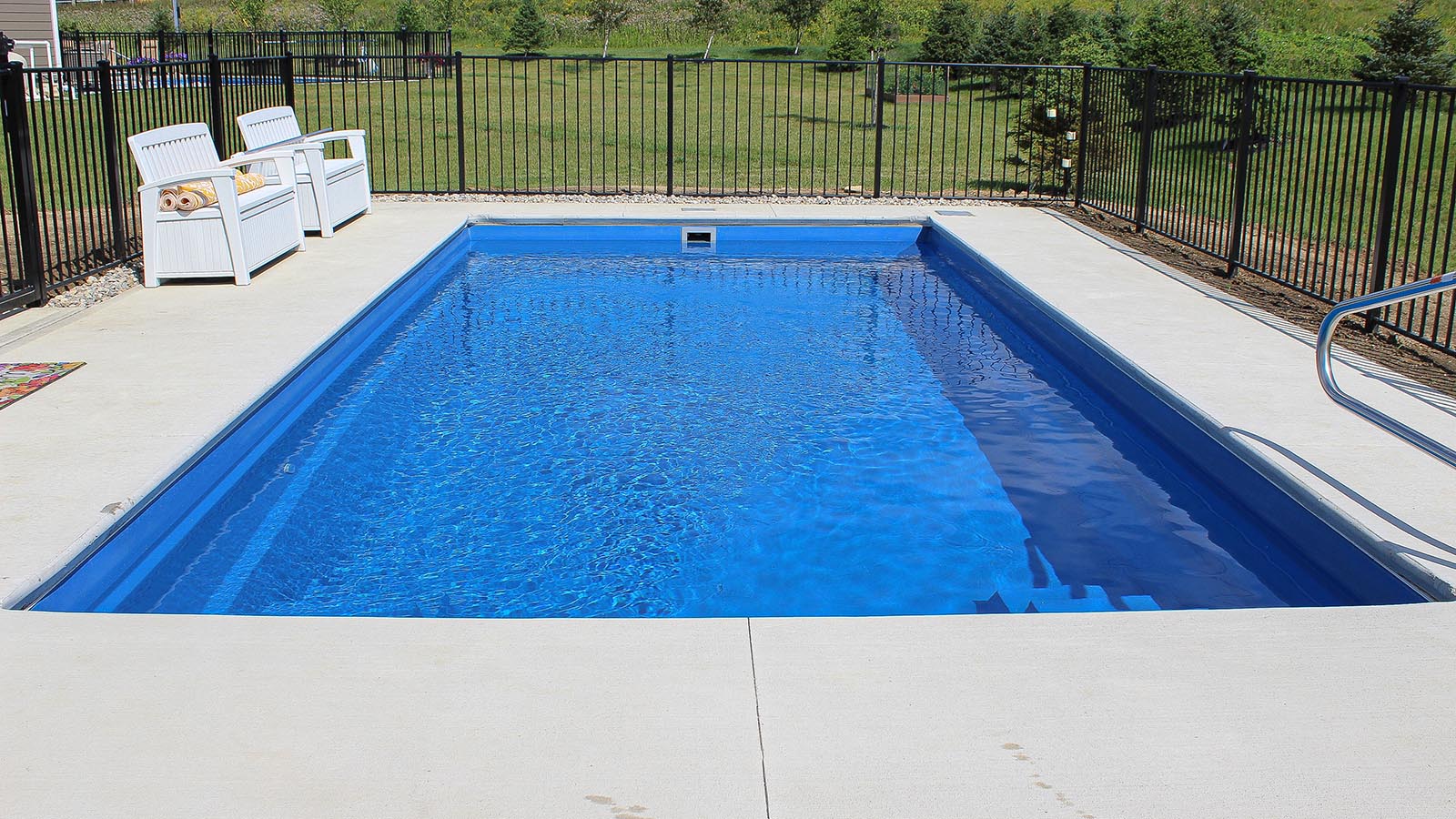 The Freedom freeform fiberglass swimming pool